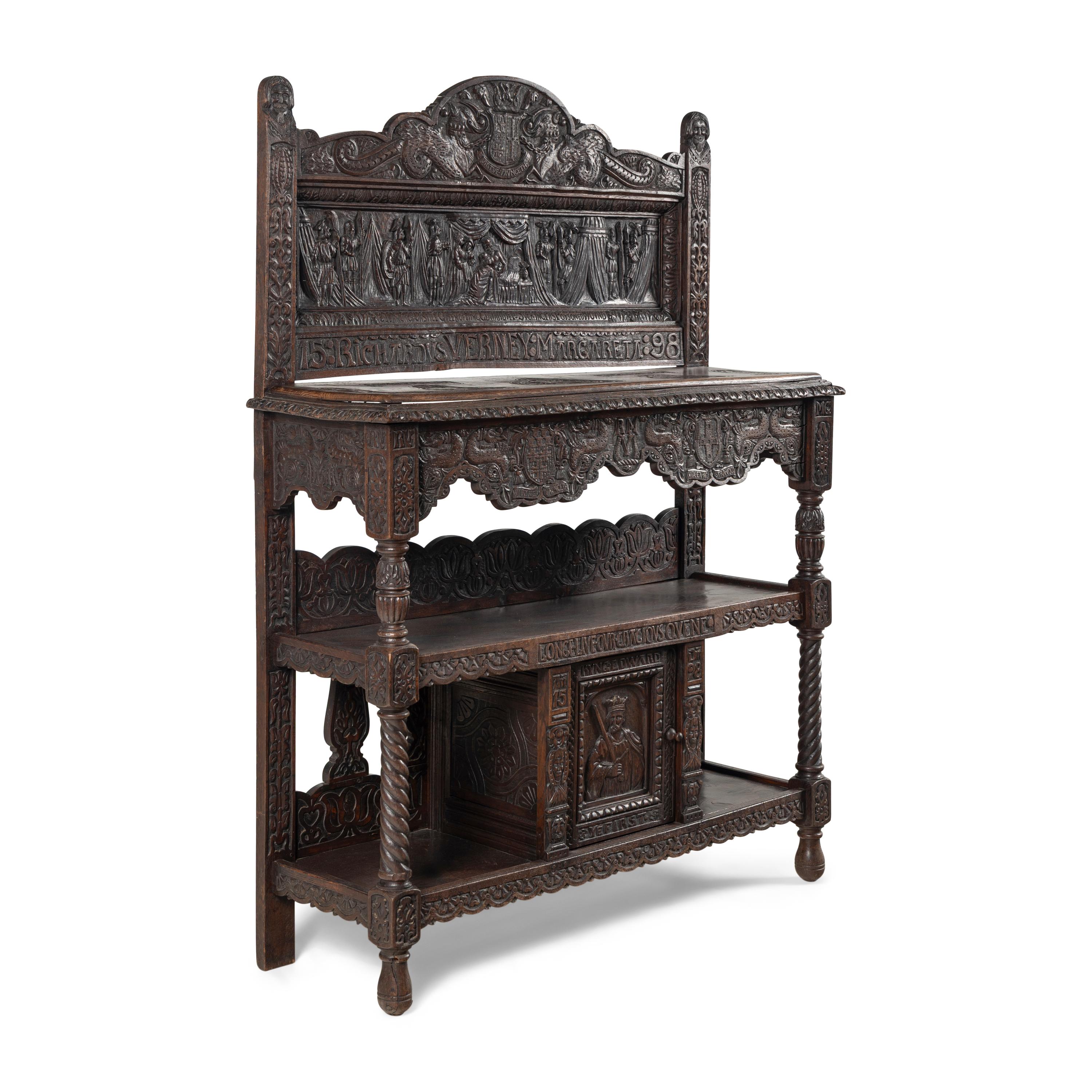 An Elizabethan Style Carved Oak Three-Tier Server