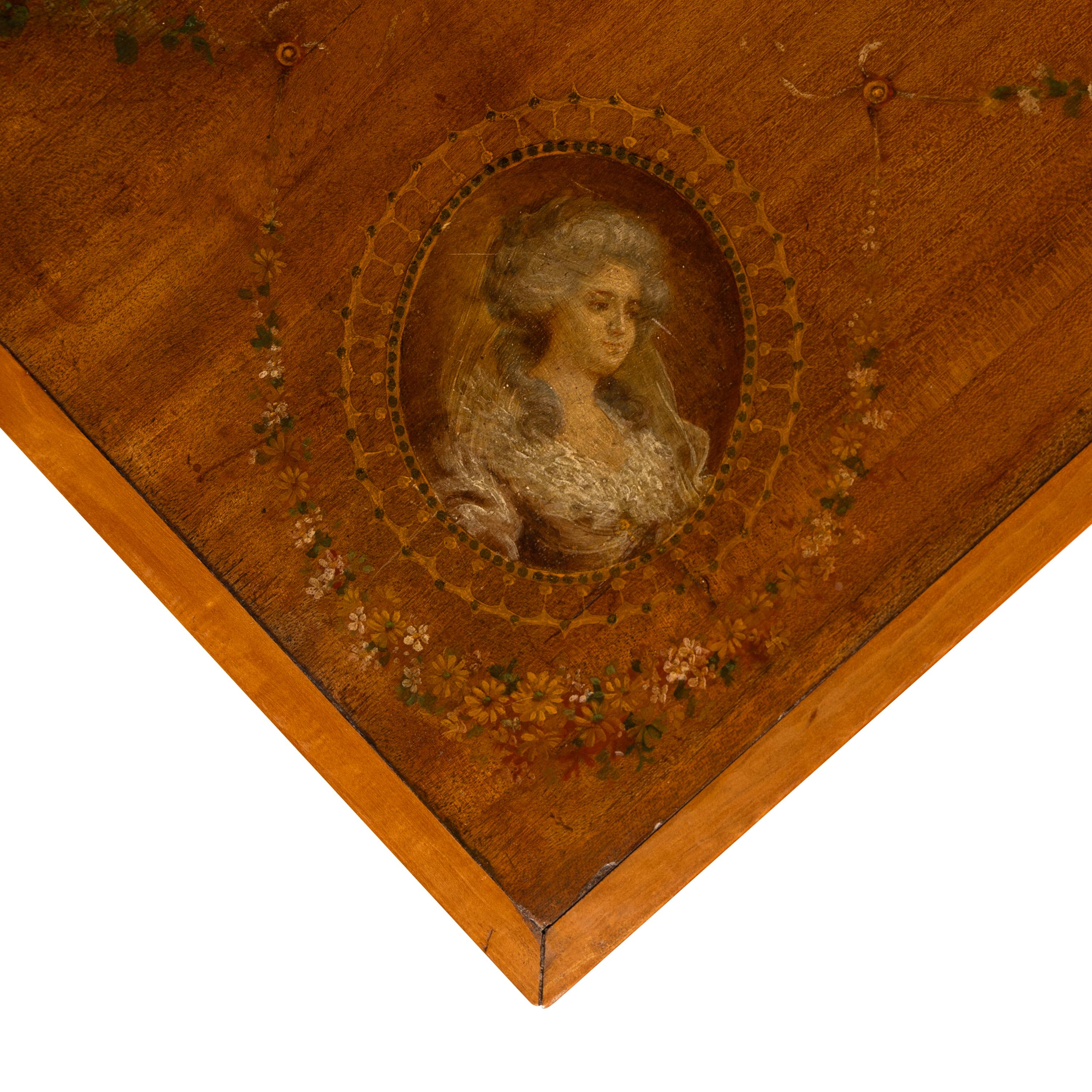 An Edwardian Satinwood and Polychrome Painted Library Table