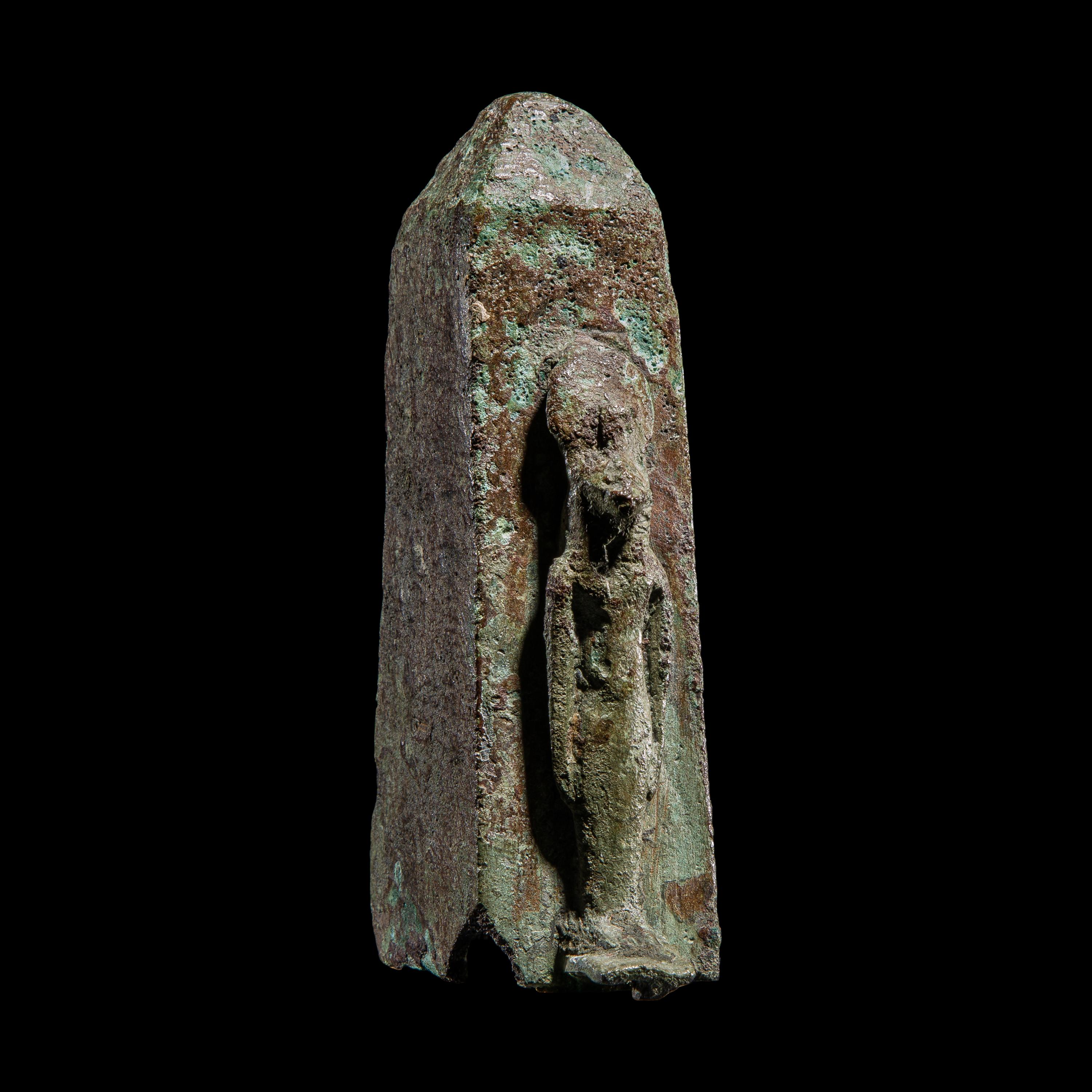 An Egyptian Bronze Lion-Headed Goddess and Obelisk