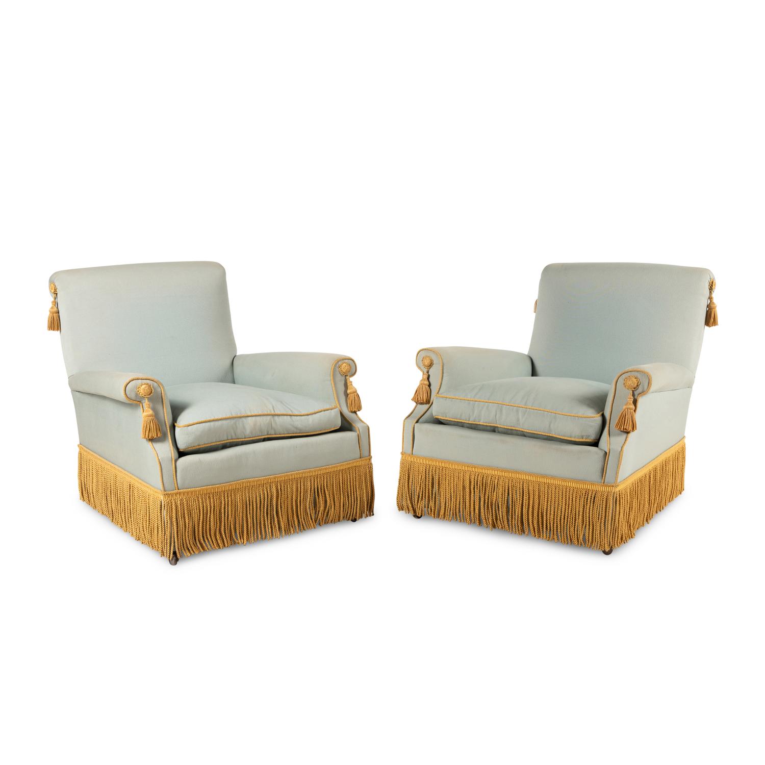 A Pair of Silk-Upholstered Easy Chairs with Buillon Fringe