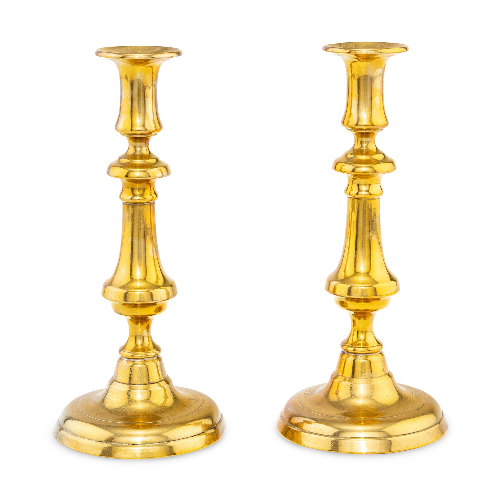 A Pair of English Brass Candlesticks