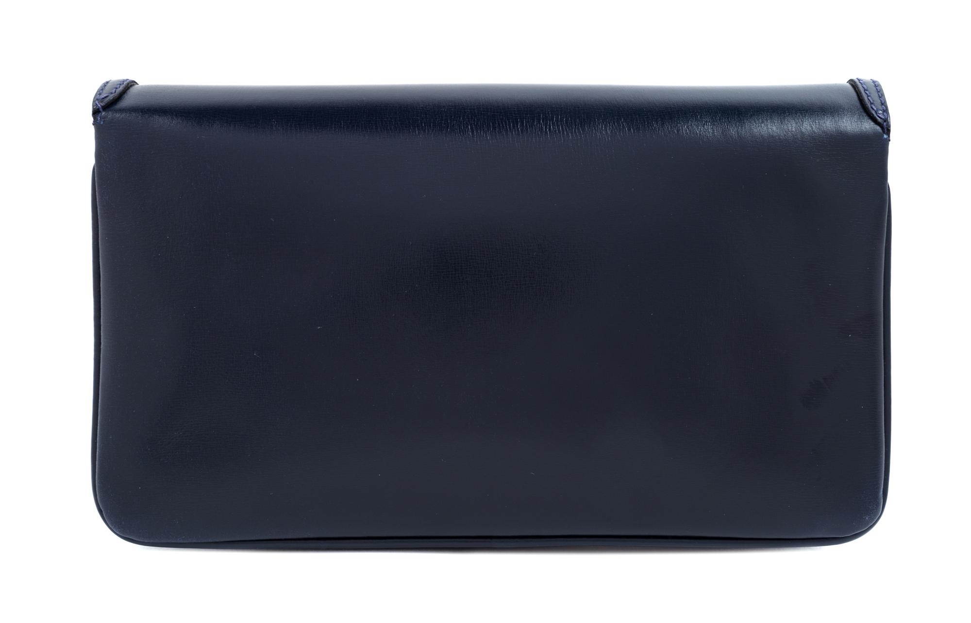 A Gucci Navy Leather Vintage Rectangular Clutch, 5.5" H x 10" W x 1" D.