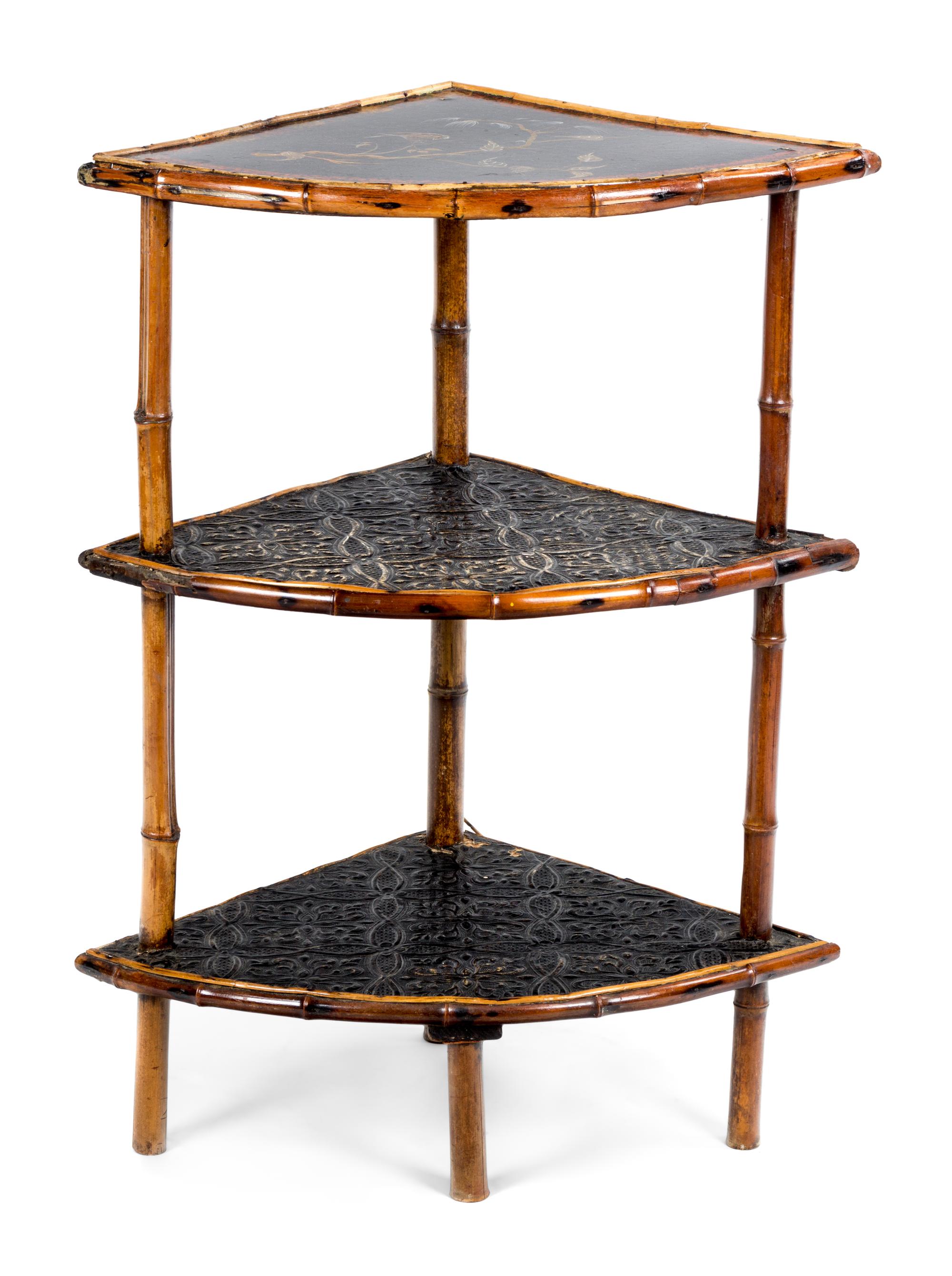 A Victorian Black Lacquered and Bamboo Three-Tiered Corner Etagere Height 32 x width 16 x depth 16 inches.