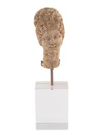 A Roman Stone Head of a Woman