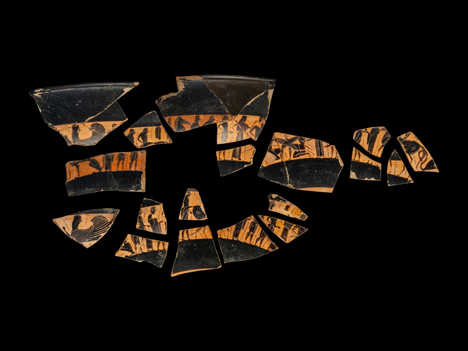 18 Attic Black-Figured Band Cup Fragments with Warriors and Sphinxes