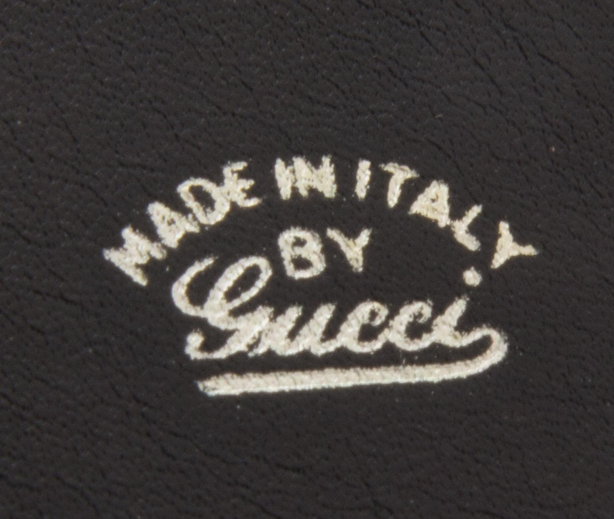 A Gucci Black Monogram Canvas Bill Fold, 6.5" x 3".