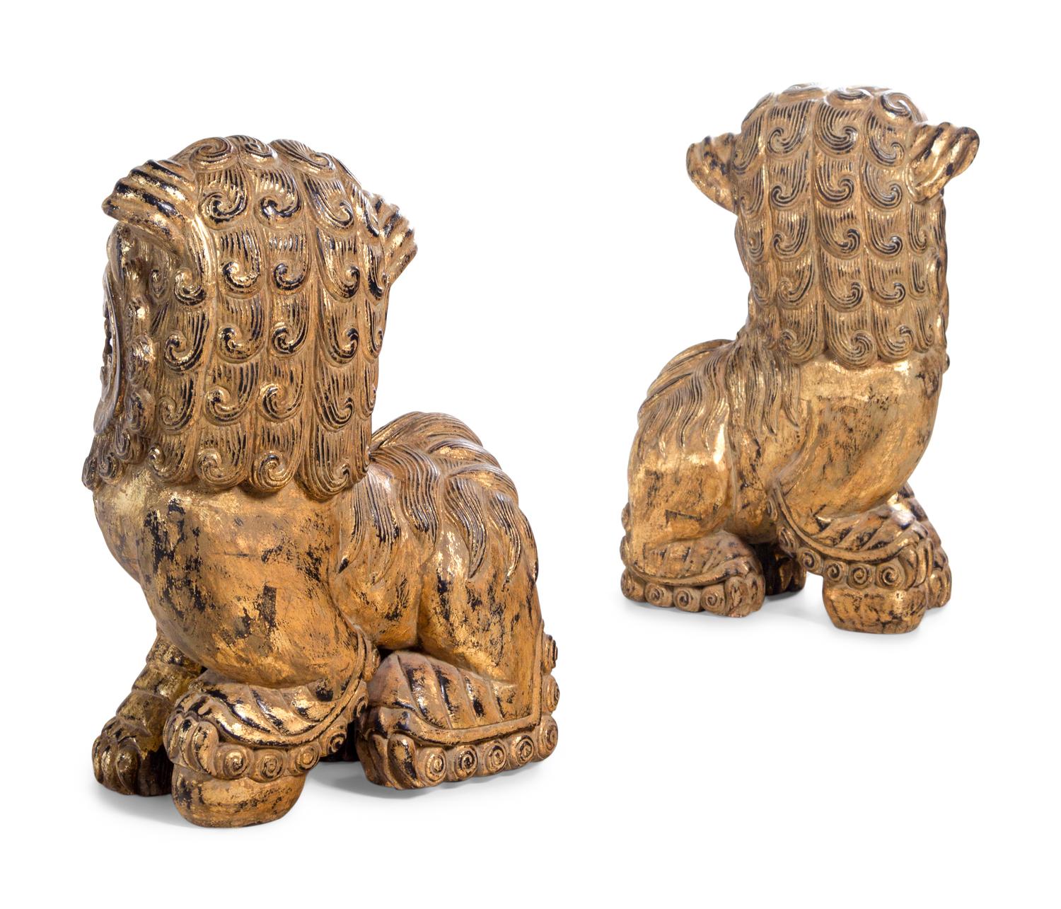 A Pair of Gilt Decorated Lion Figures
