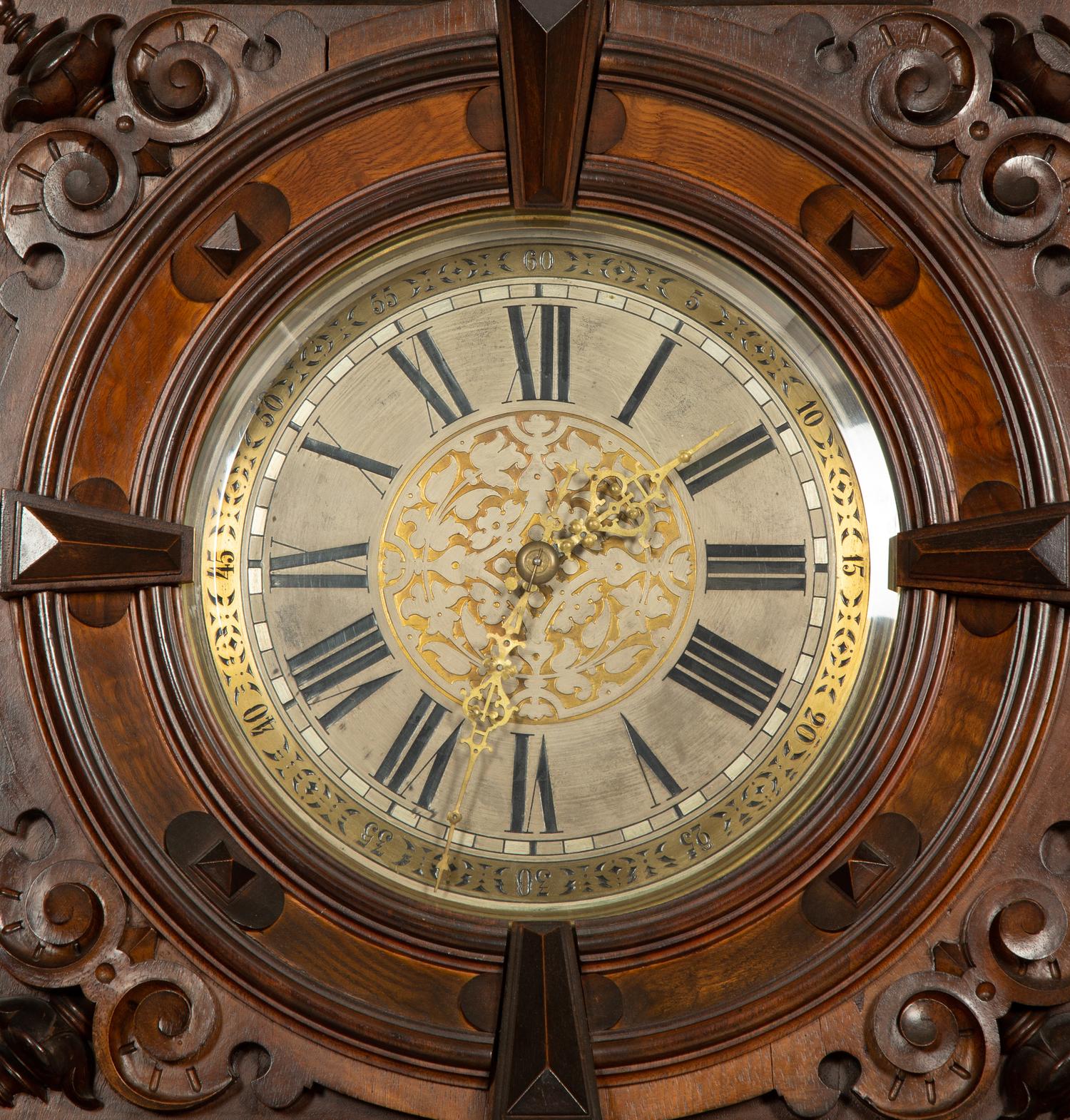 A German Carved Walnut and Marquetry Tall Case Clock