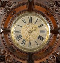 A German Carved Walnut and Marquetry Tall Case Clock
