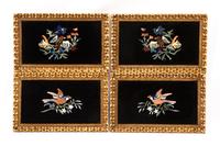A Set of Four Italian Pietra Dura Plaques in Giltwood Frames