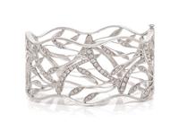 A White Gold and Diamond Openwork Bangle Bracelet, 25.80 dwts.