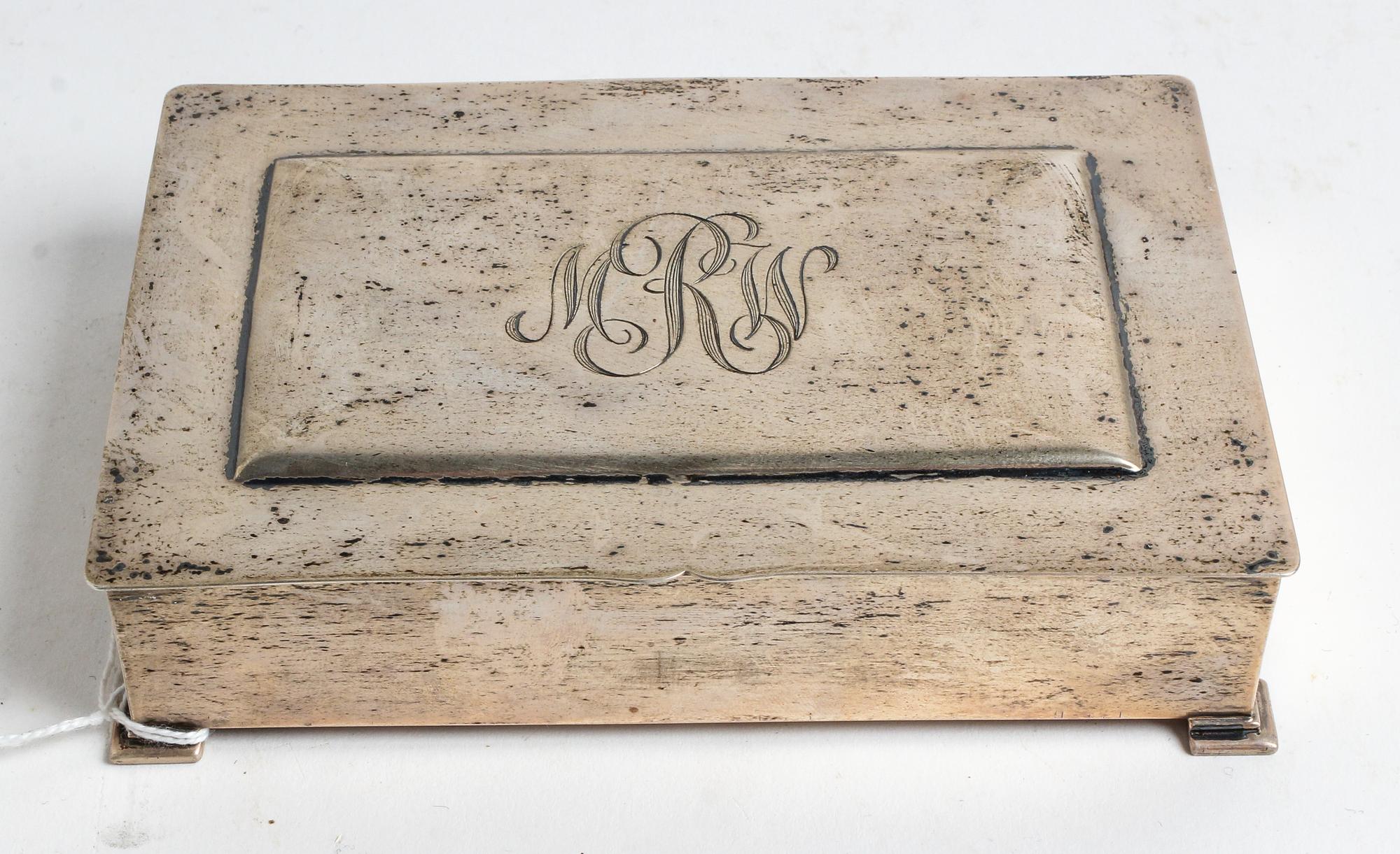 A Cigarette Case, BLACK, STAR & GORHAM, having an interior wood liner.