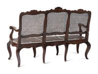 An Italian Rococo Style Carved Walnut Settee