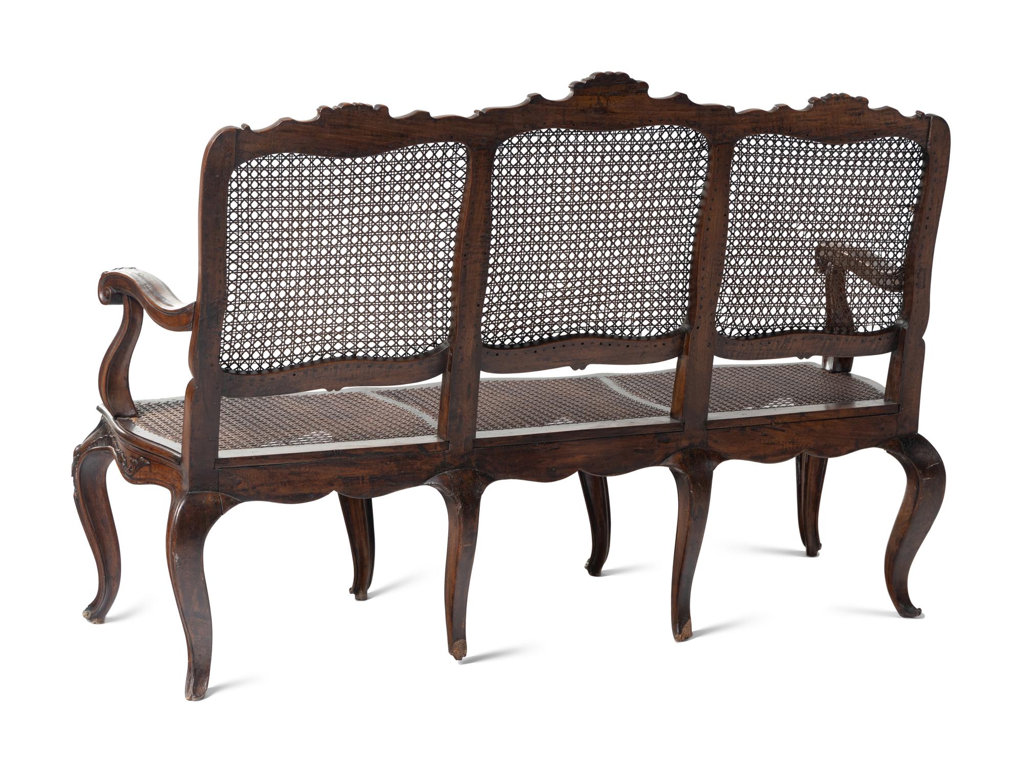 An Italian Rococo Style Carved Walnut Settee