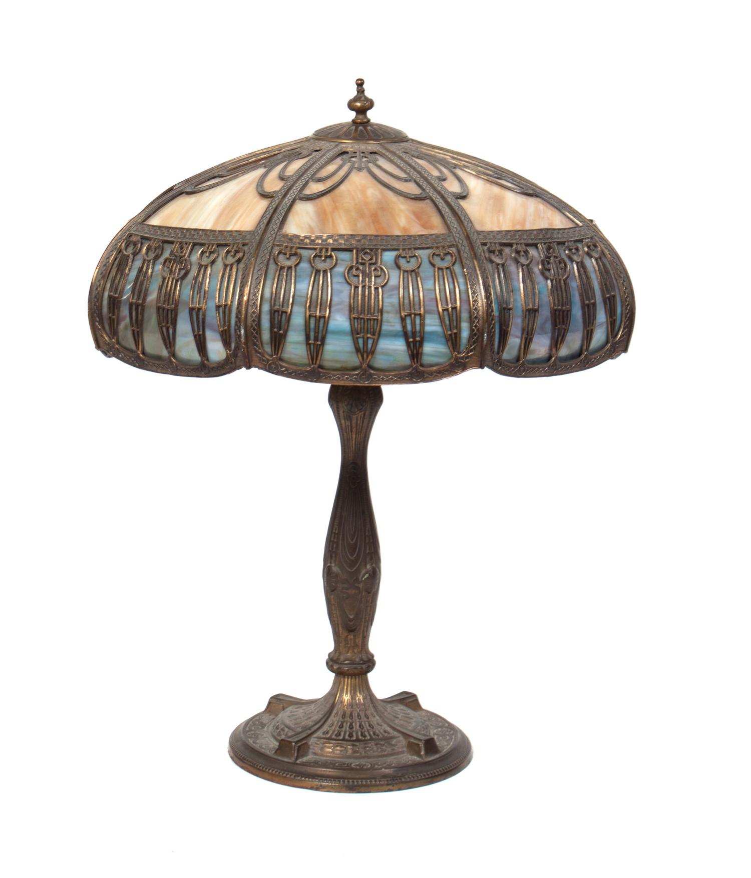 A Silvered Metal and Slag Glass Table Lamp Height 26 inches.
