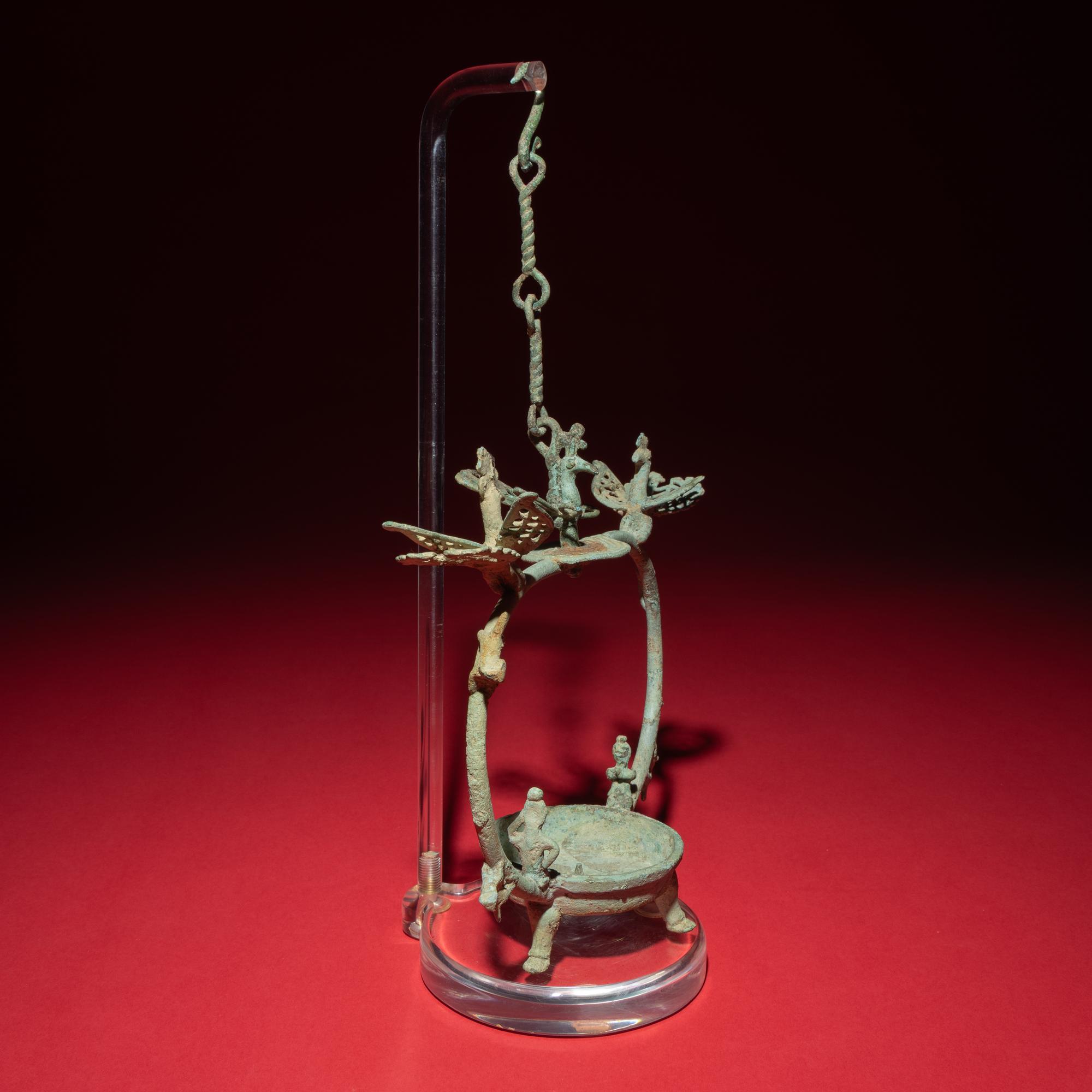 A Chinese Bronze 'Phoenix and Immortal' Hanging Oil Lamp, Eastern Han Dynasty — 東漢 青銅龍鳳神人懸燈