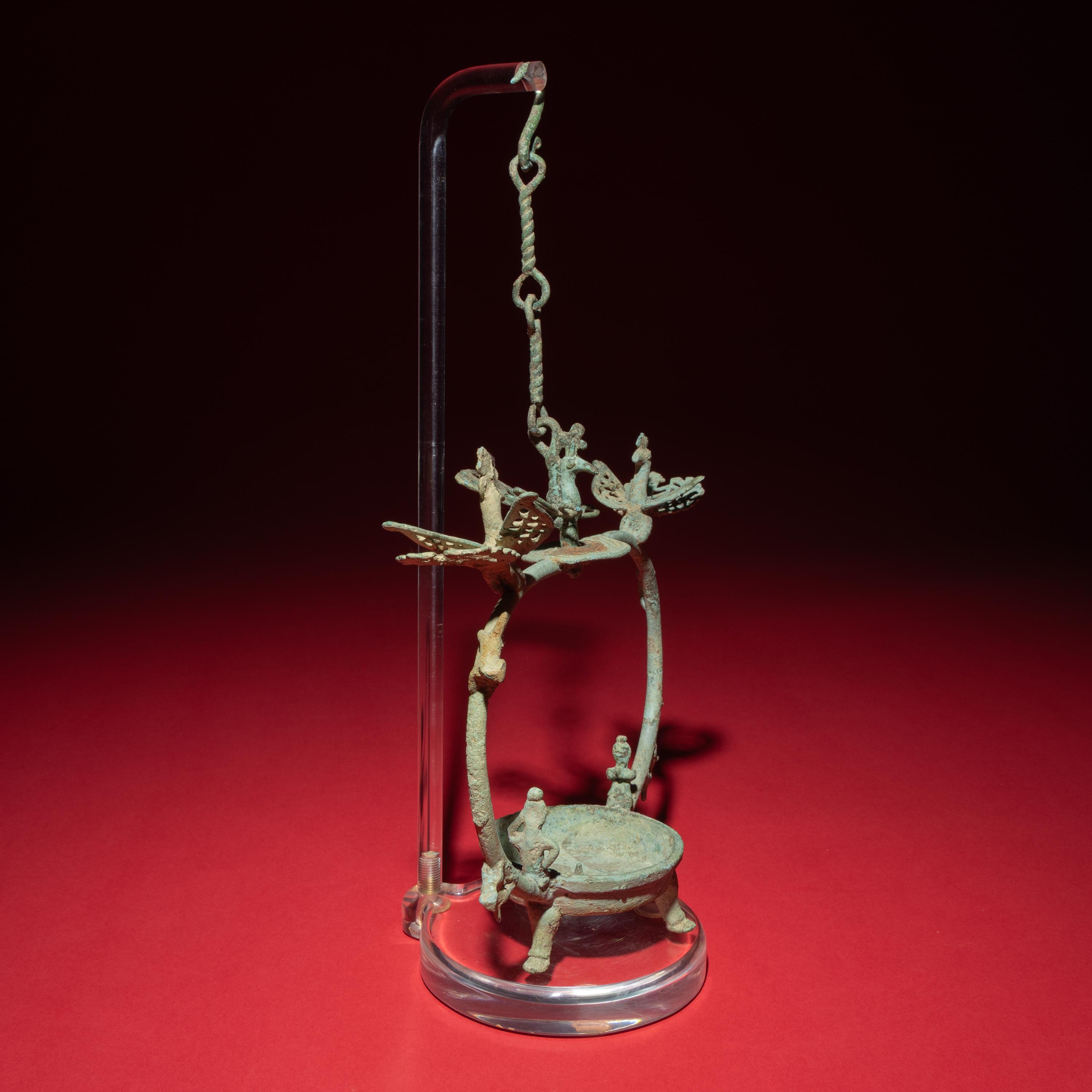 A Chinese Bronze 'Phoenix and Immortal' Hanging Oil Lamp, Eastern Han Dynasty — 東漢 青銅龍鳳神人懸燈