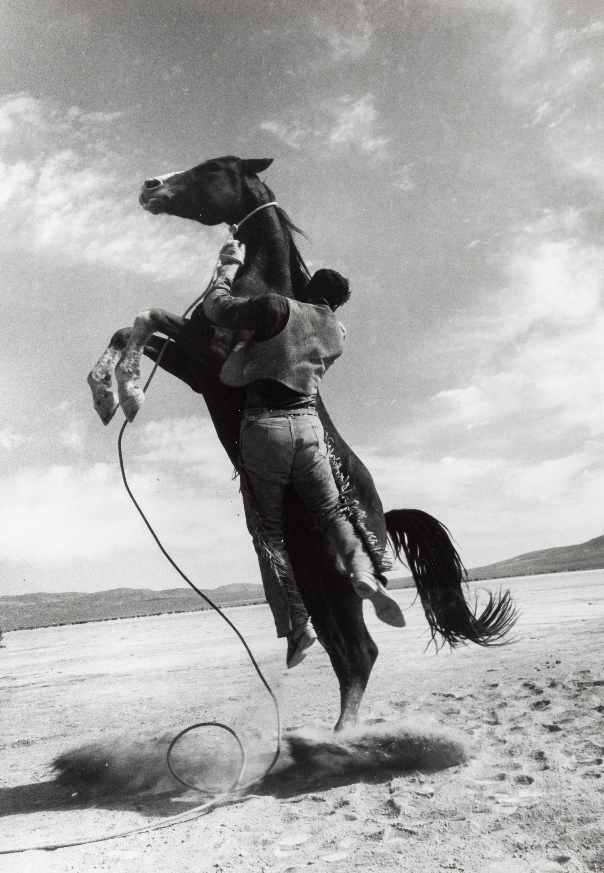 Ernst Haas (1921-1986) Leaping Horse (Clark Gable as Guy Langland doing his own stunts, on the set of "The Misfits,") Nevada, 1960