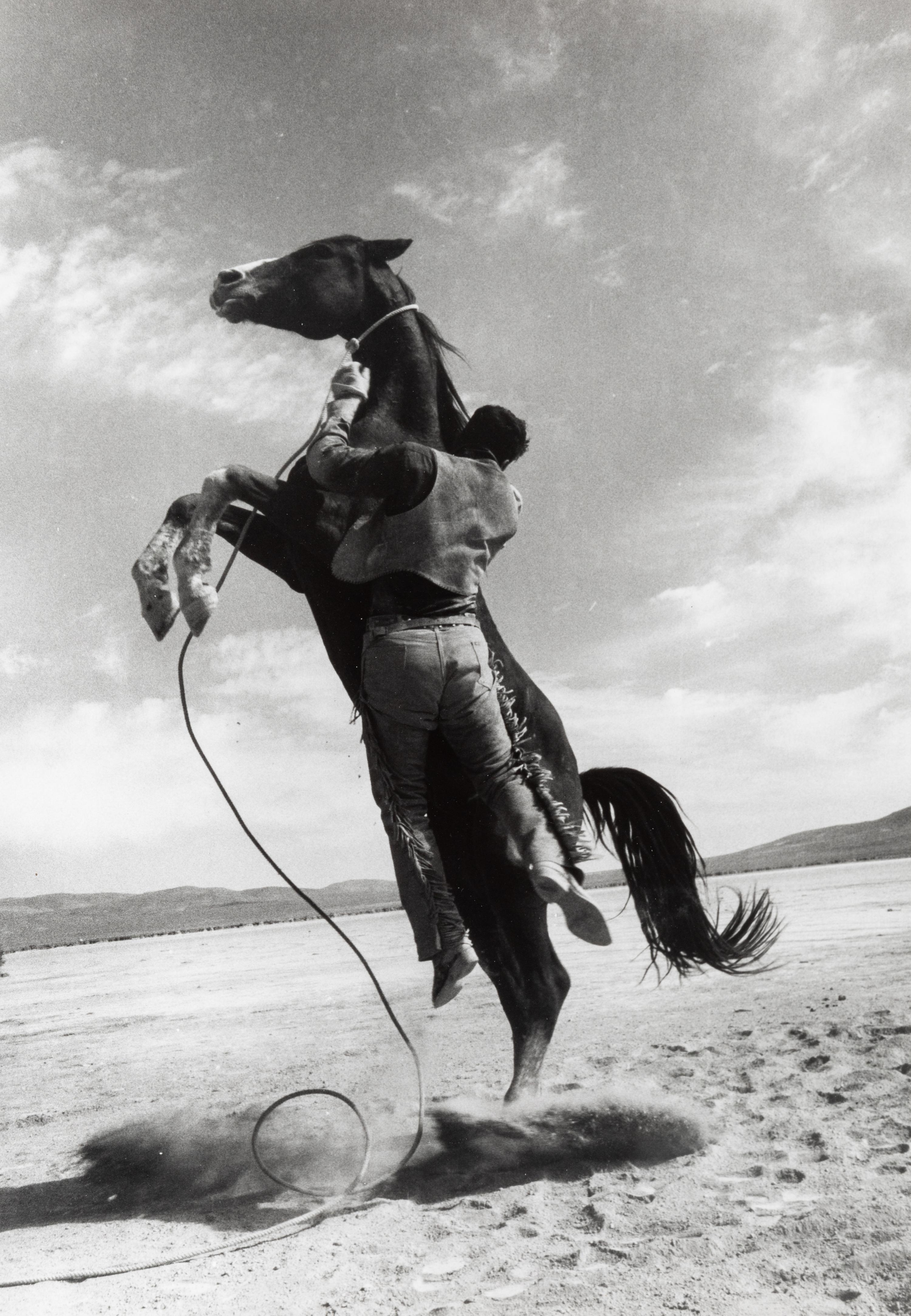 Ernst Haas (1921-1986) Leaping Horse (Clark Gable as Guy Langland doing his own stunts, on the set of "The Misfits,") Nevada, 1960