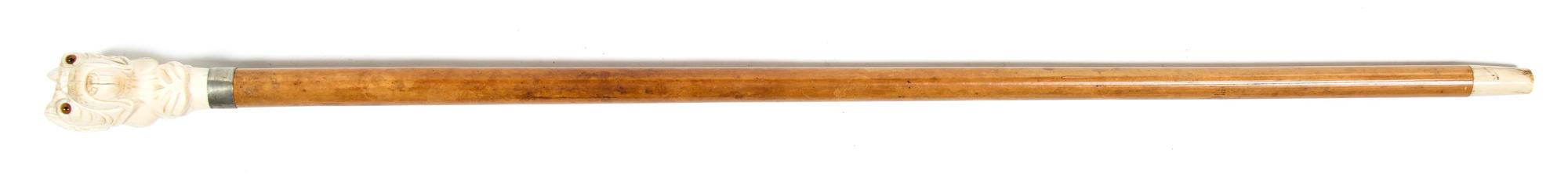 A Continental Carved Ivory and Wood Walking Stick, Height overall 37 x height of handle 3 7/8 inches.