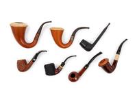 A Collection of Seven Smoking Pipes