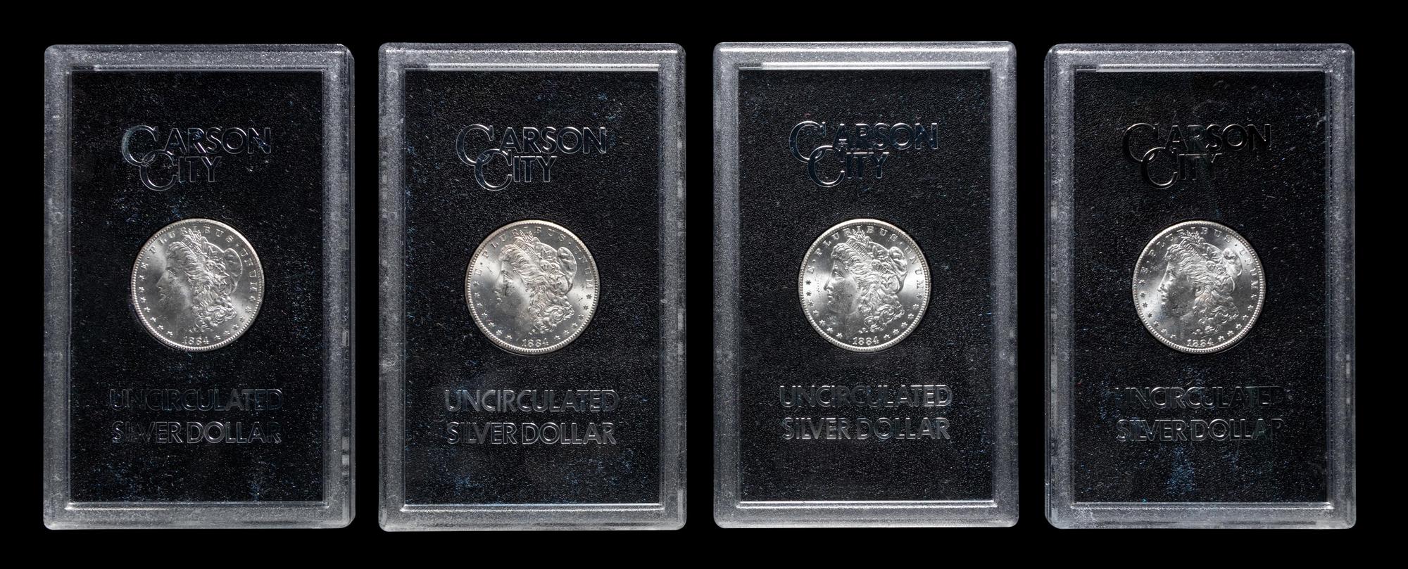 A Group of Eight 1884-CC GSA: Morgan $1 Coins