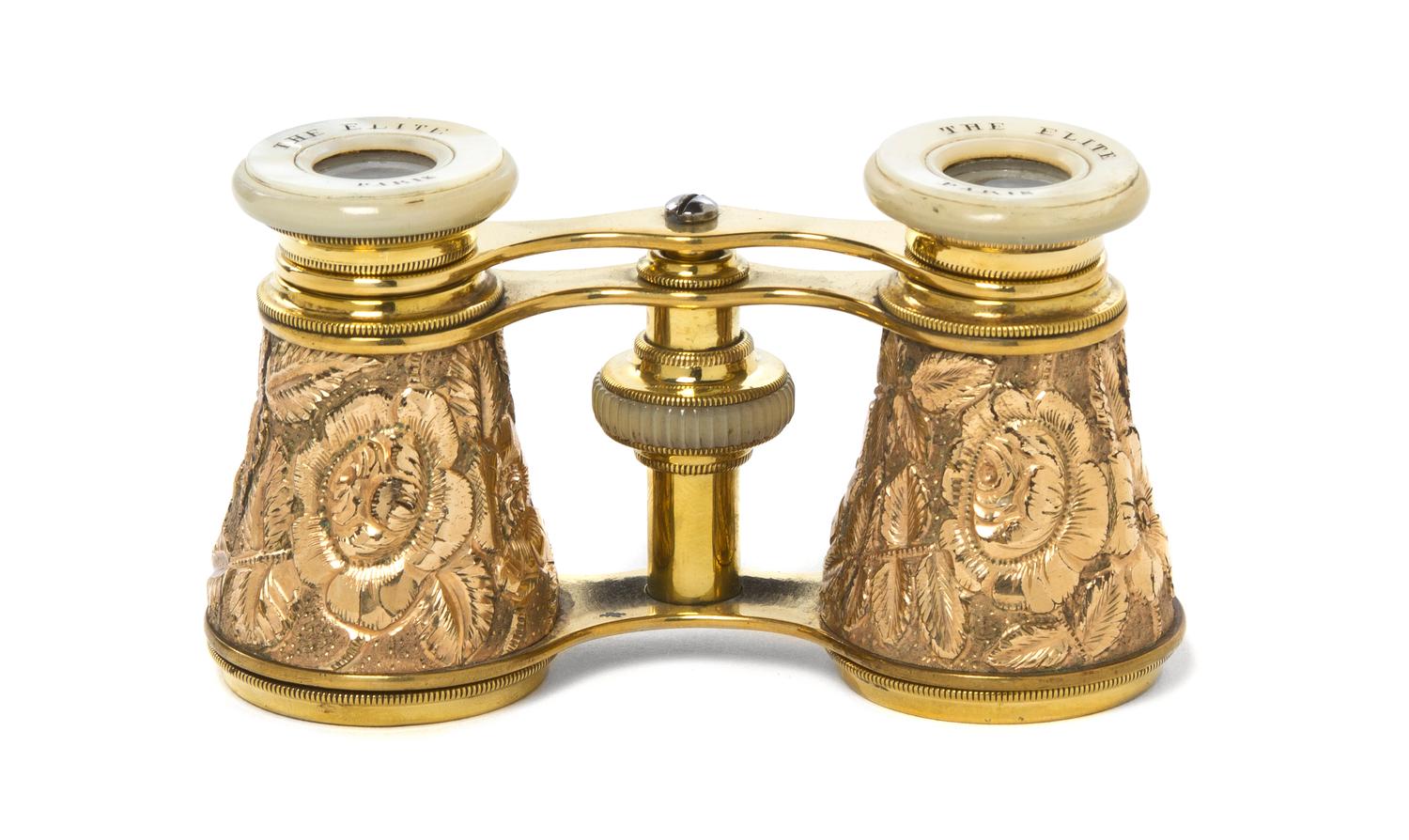 A Pair of French Gold Filled Opera Glasses, The Elite, Width 3 7/8 inches.