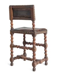 A Set of Six Spanish Baroque Style Walnut Dining Chairs
