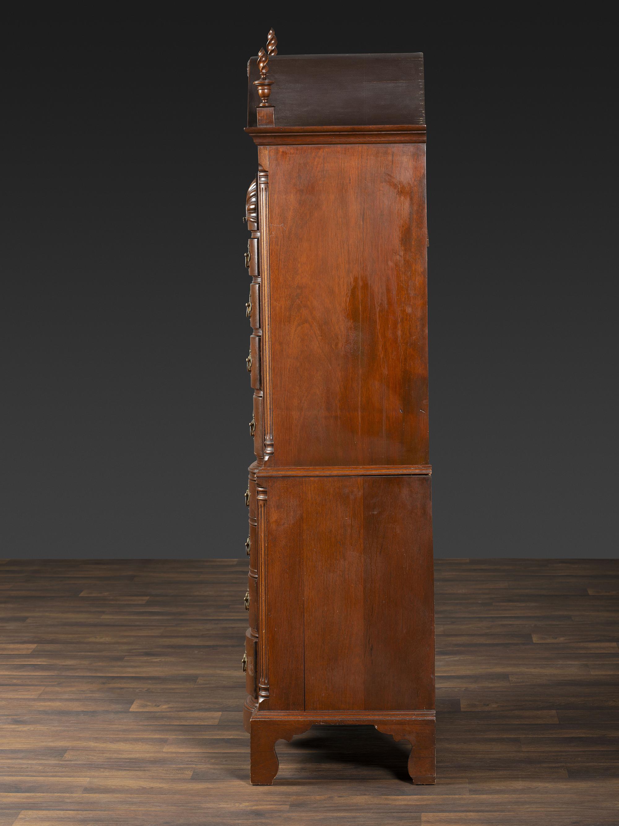 A Chippendale Style Shell and Rosette Carved Mahogany Block Front Chest-On-Chest