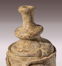 An Islamic Yellow-Green Glass Bottle
