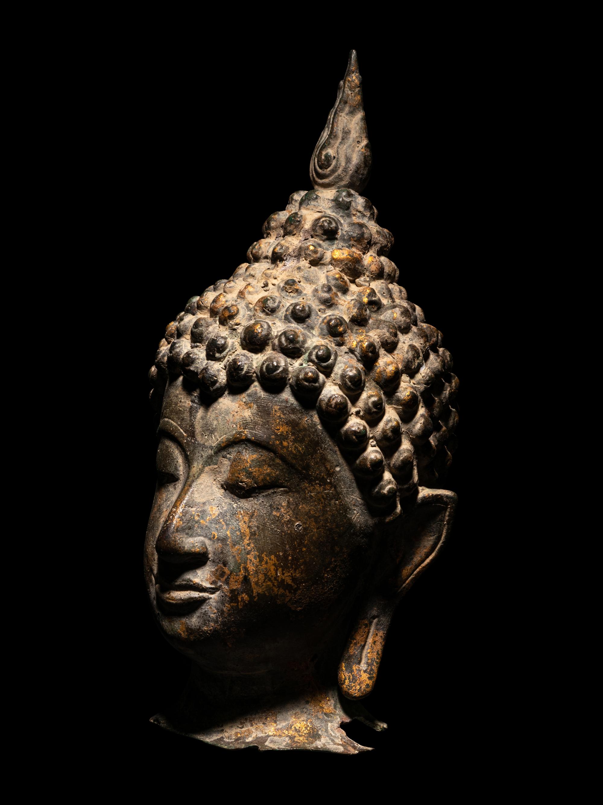 A Bronze Buddha Head