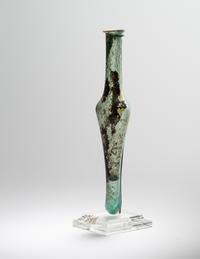 A Roman Pale Blue Glass Unguentarium