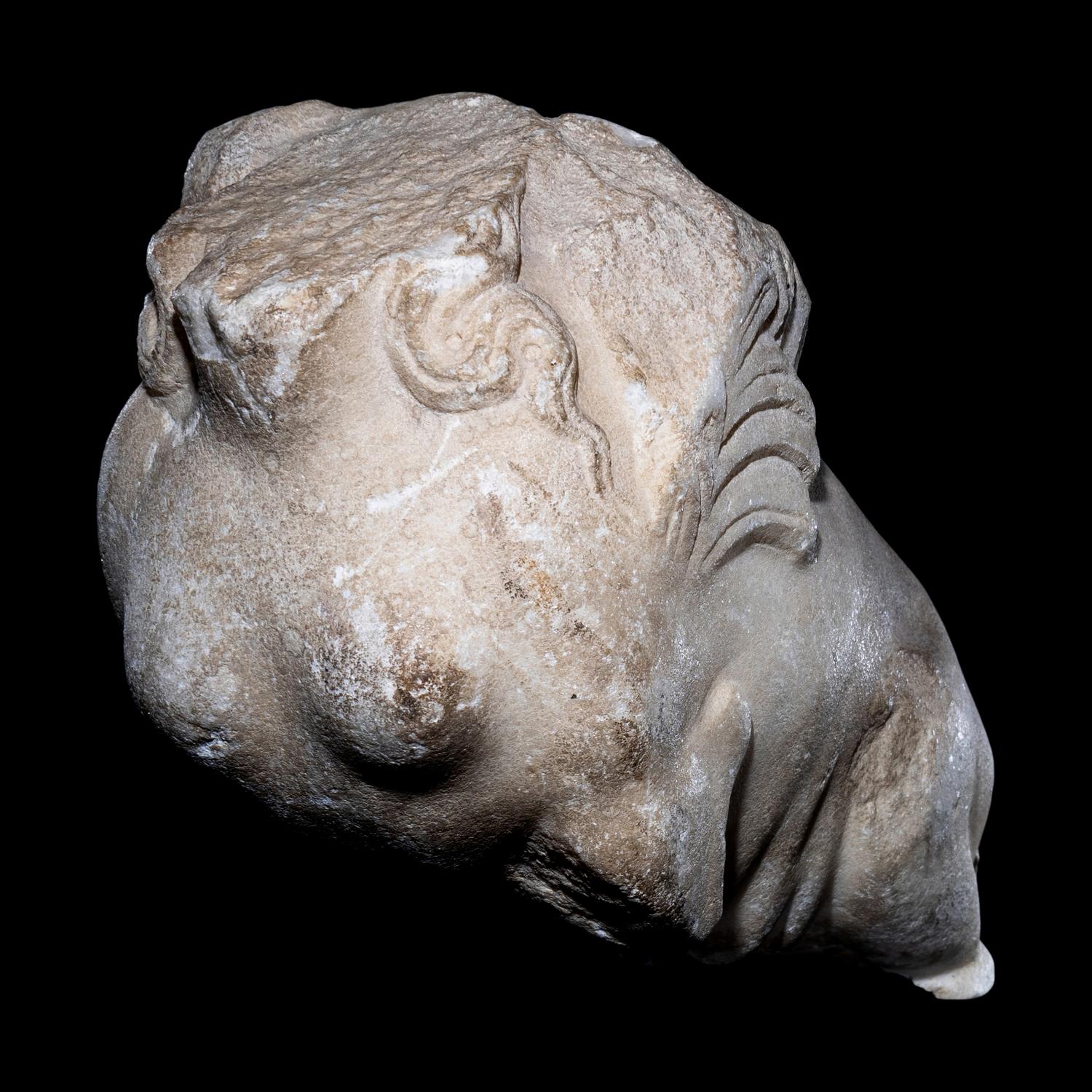 A Roman Marble Fragment of a Sphinx