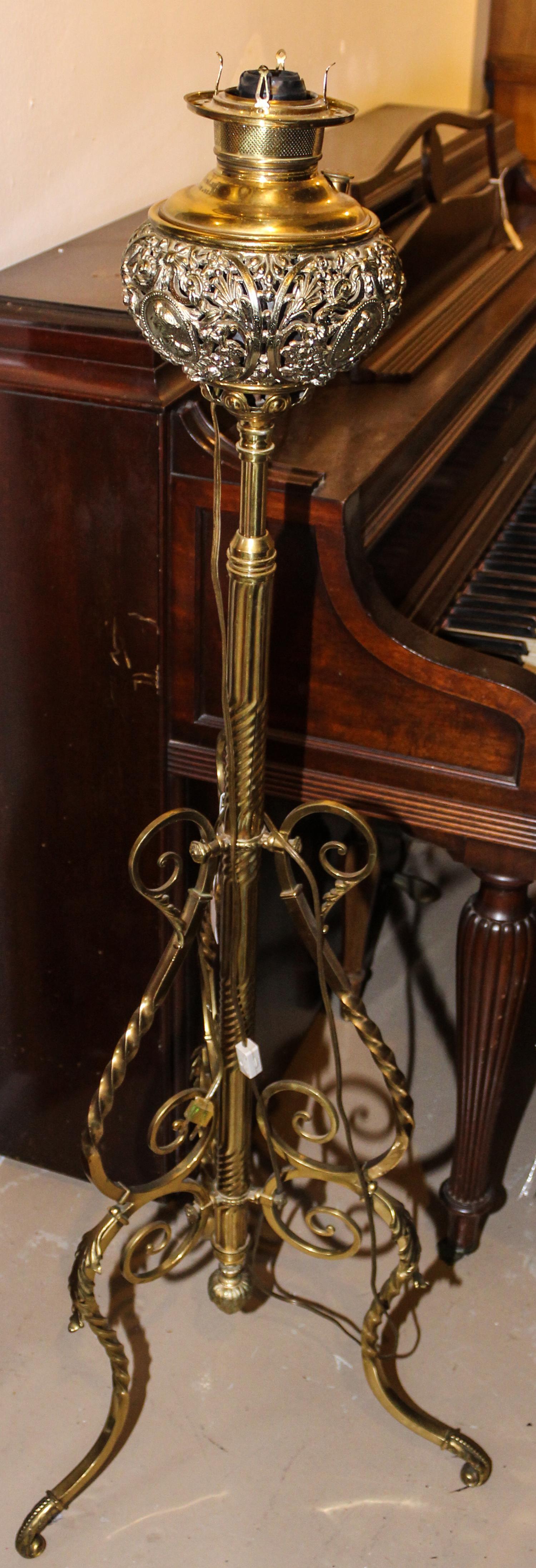 A Victorian Brass Oil Lamp, Juno Lamp Co. Height overall 61 inches.