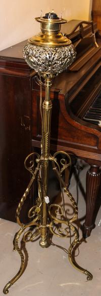 A Victorian Brass Oil Lamp, Juno Lamp Co. Height overall 61 inches.