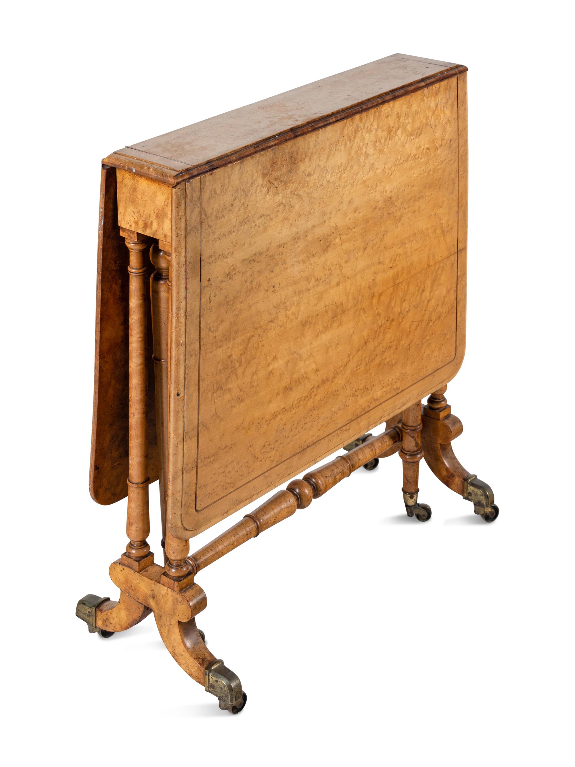 A Victorian Bird's Eye Maple Sutherland Table