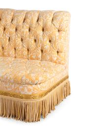 A Custom Button-Tufted Banquette with Fortuny Upholstery
