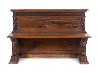 An Italian Renaissance Revival Carved Walnut Hall Bench