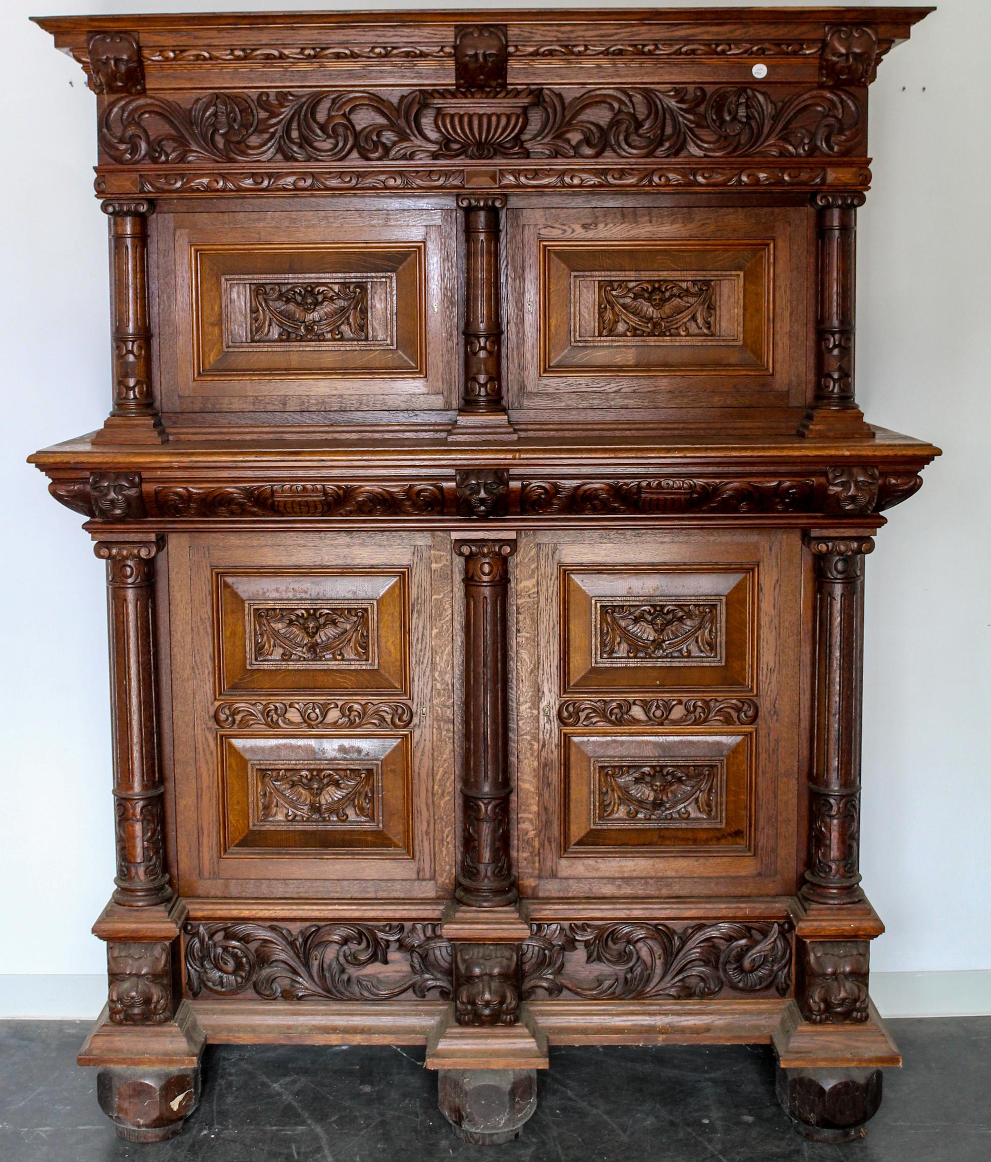 A Continental Carved Oak Wardrobe. Height 81 x width 62 x depth 24 inches.