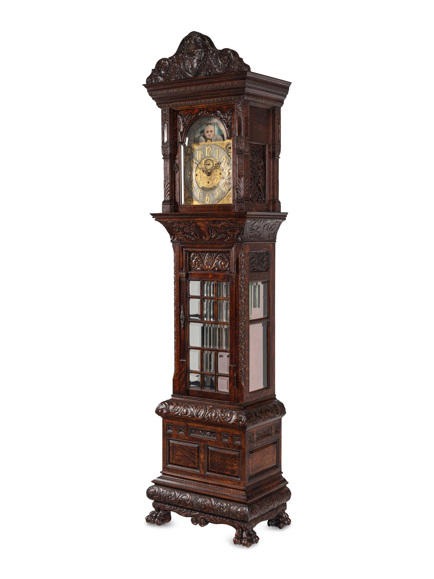 A Renaissance Revival Carved Oak Eight-Tube Tall Case Clock
