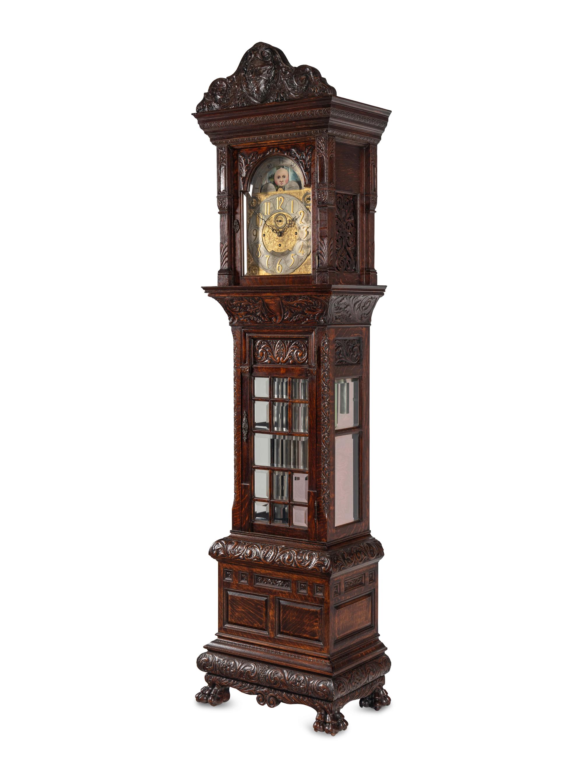 A Renaissance Revival Carved Oak Eight-Tube Tall Case Clock