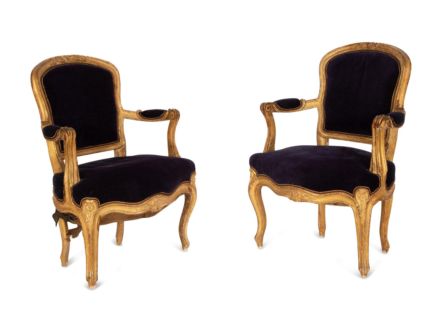 A Pair of Louis XV Giltwood Fauteuils