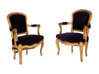 A Pair of Louis XV Giltwood Fauteuils