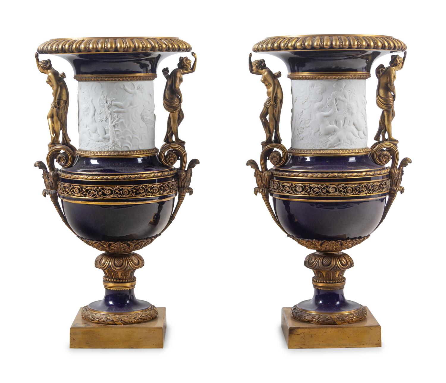 A Pair of French Gilt Bronze Mounted Bisque and Cobalt Glazed Porcelain Urns