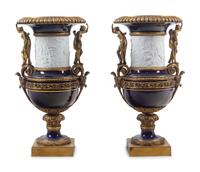 A Pair of French Gilt Bronze Mounted Bisque and Cobalt Glazed Porcelain Urns
