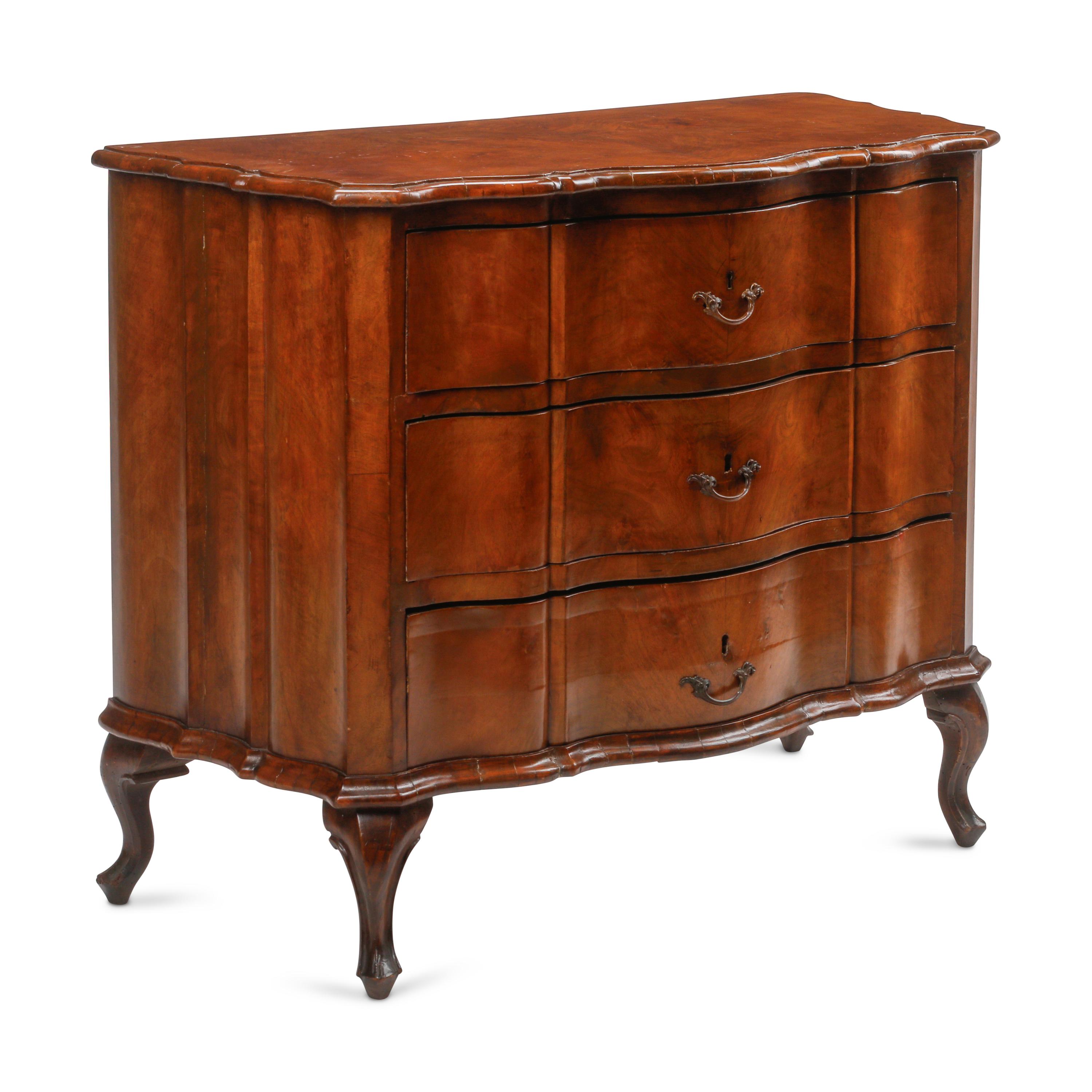 An Italian Walnut Serpentine-Front Chest of Drawers