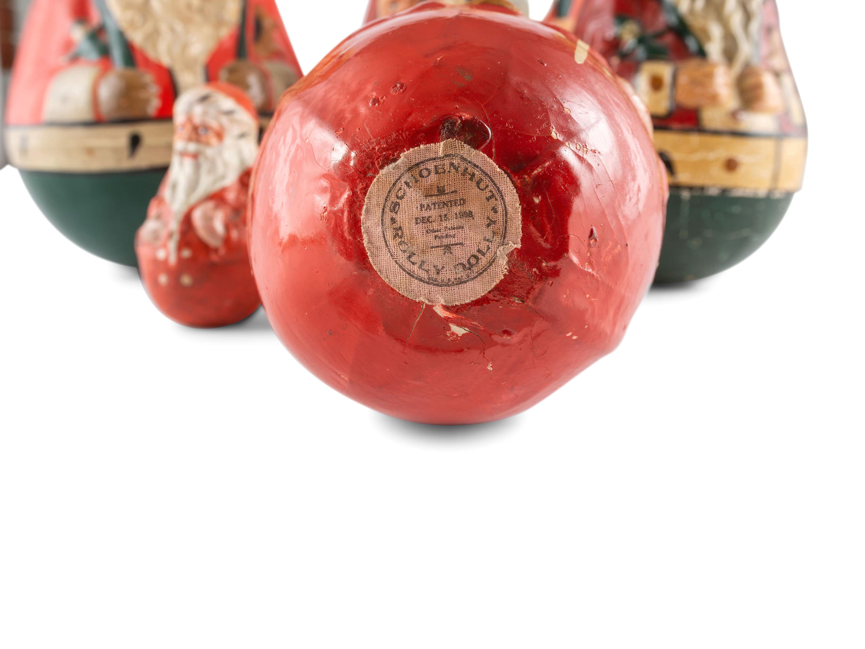 Six "Rolly Polly" Santa Figures