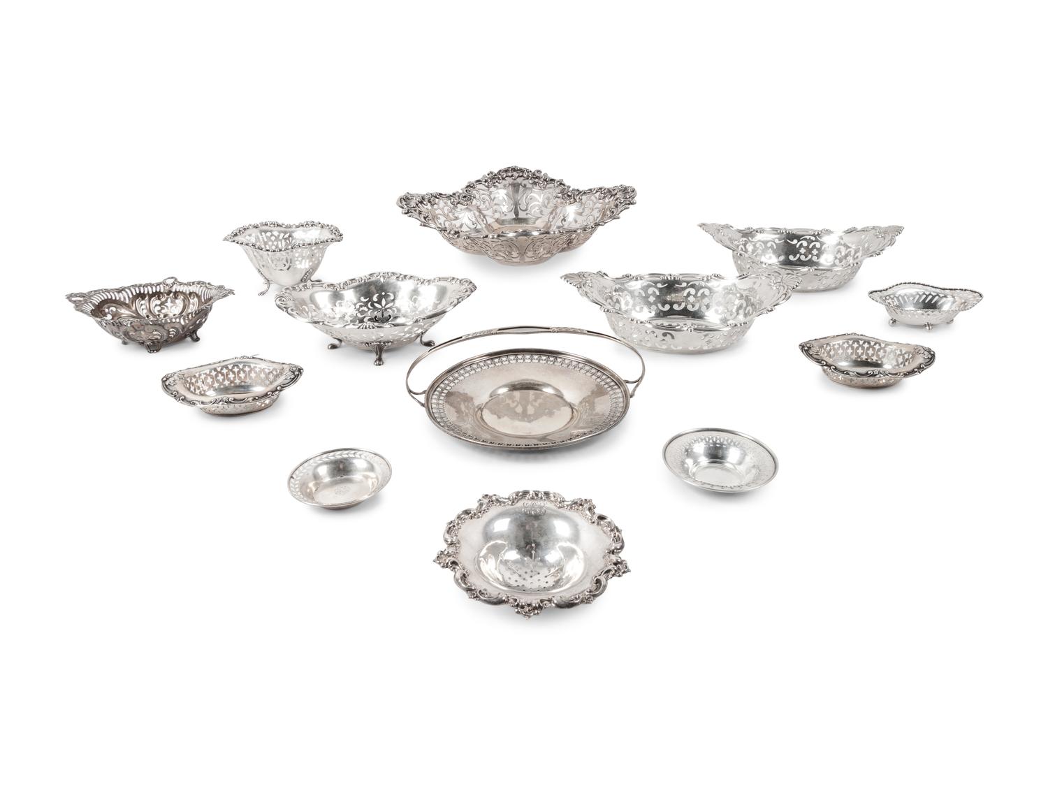 A Large Group of American Pierced Silver Dishes