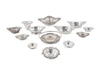 A Large Group of American Pierced Silver Dishes