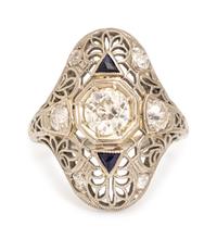 An Art Deco 18 Karat White Gold, Diamond and Synthetic Sapphire Ring,